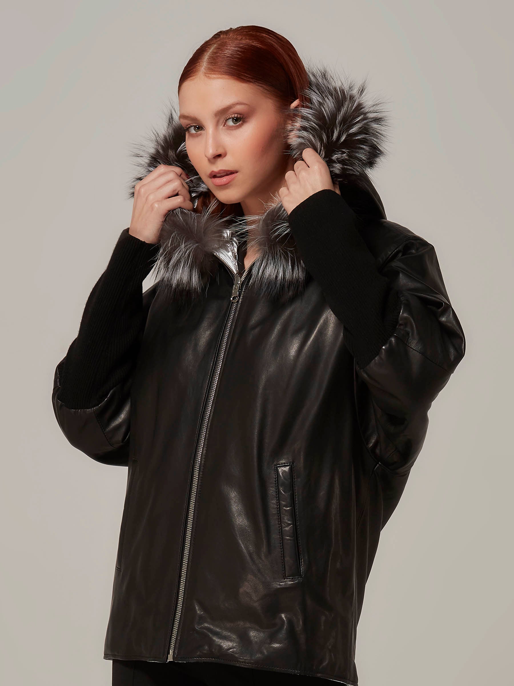 Black Reversible Leather Puffer JAcket with Fox Fur Hood front pose