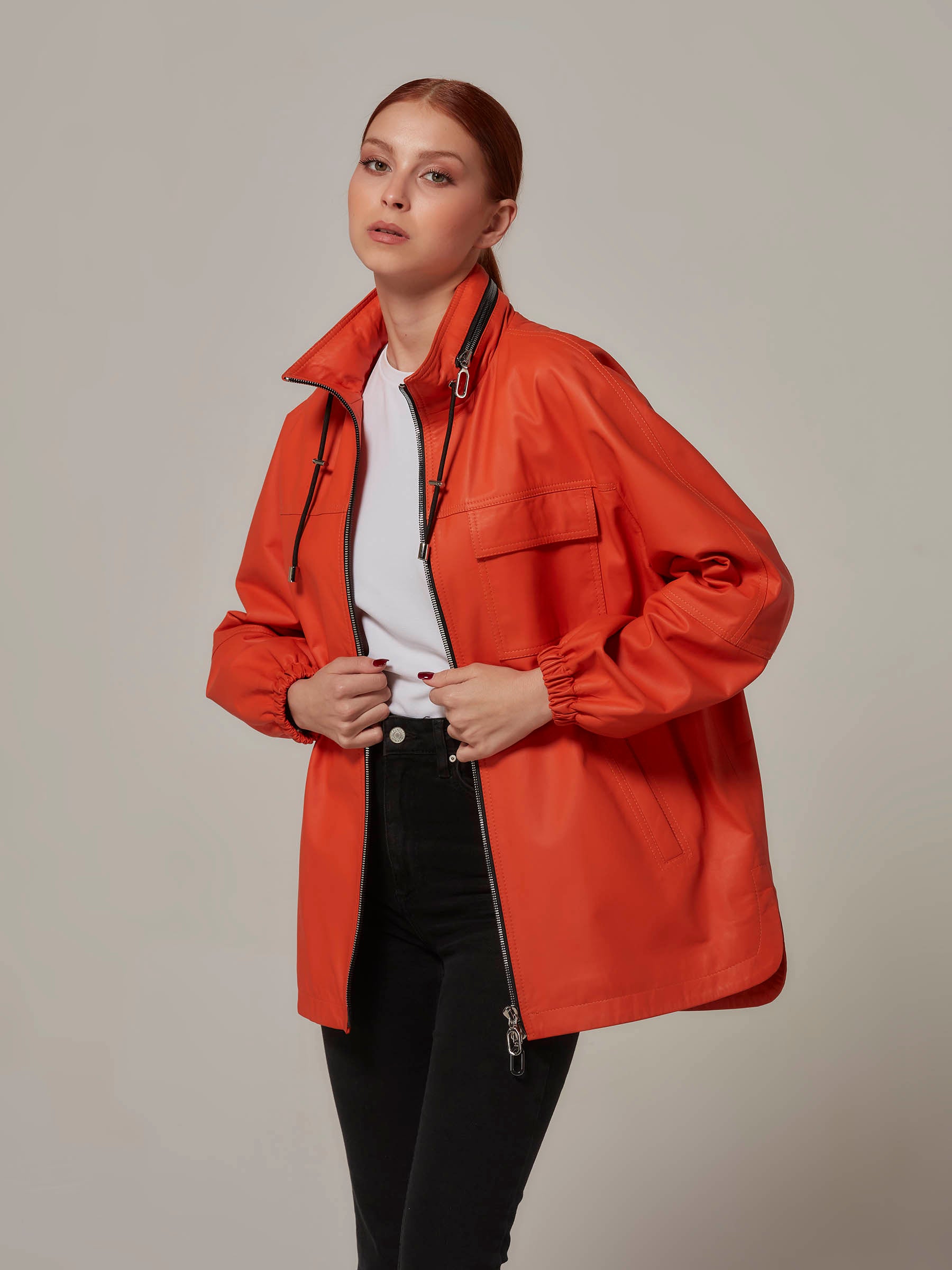 Matte Orange Leather Jacket with Hood Minimalist Design front pose close up