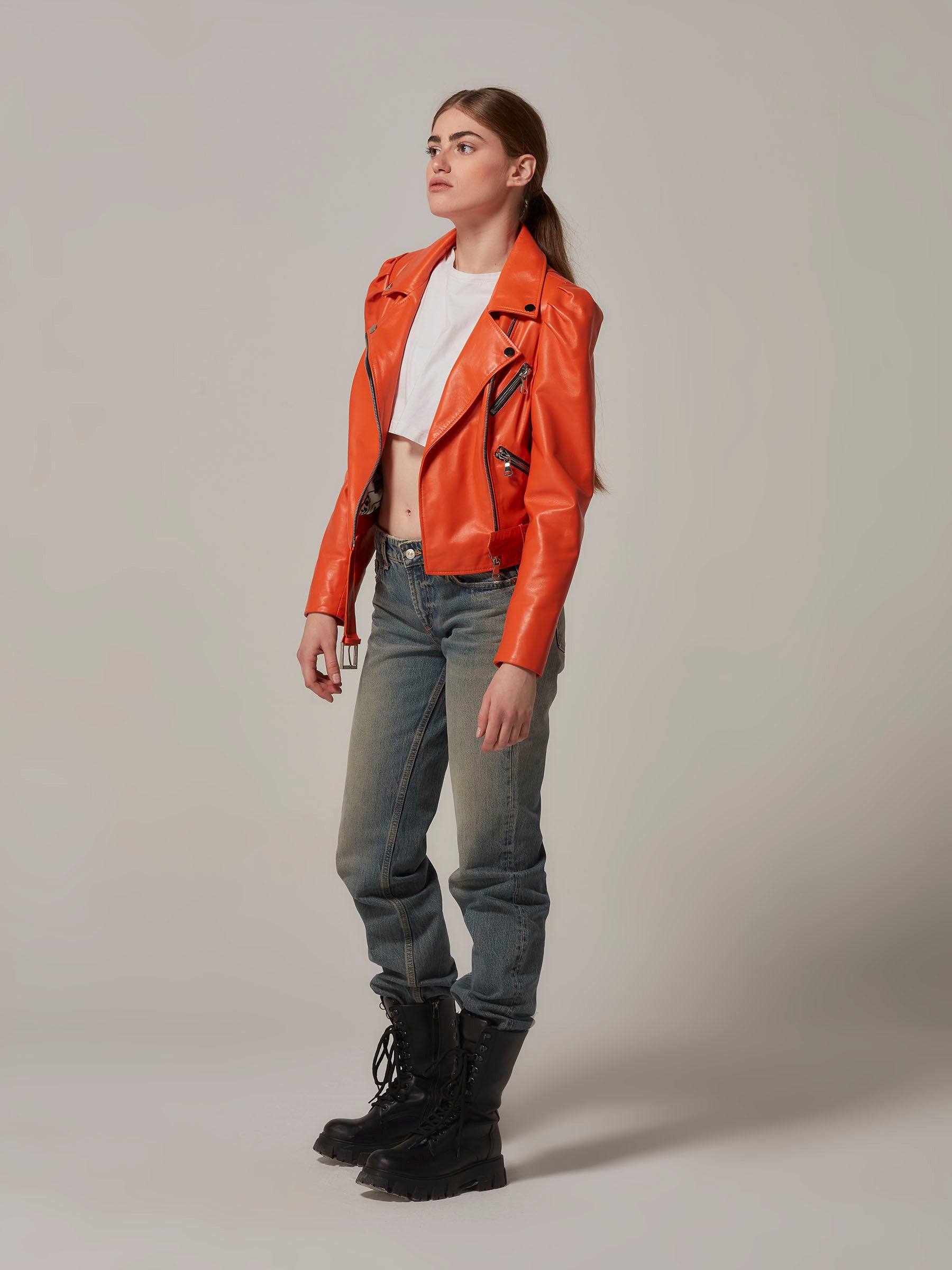 Orange Cropped Leather Motorcycle Jacket with Puffy Shoulders side full length